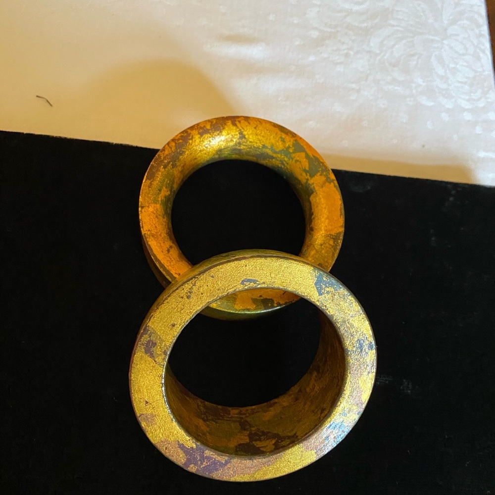 Elegant pair of lacquered wood bracelets.
